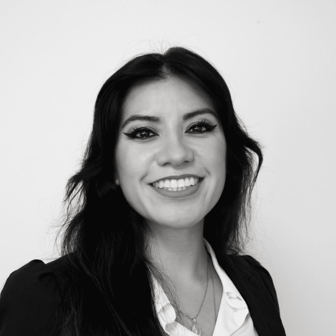 Smiling woman in a professional portrait.